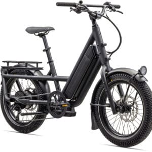 A black electric bike is parked on the ground.